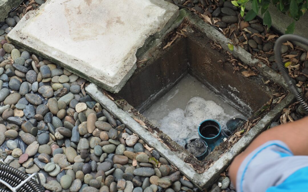 Why is my basement drain backing up during heavy rain?